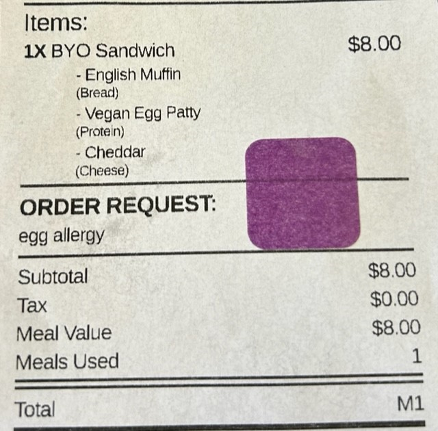 Receipt with purple sticker to show allergen acknowledgement