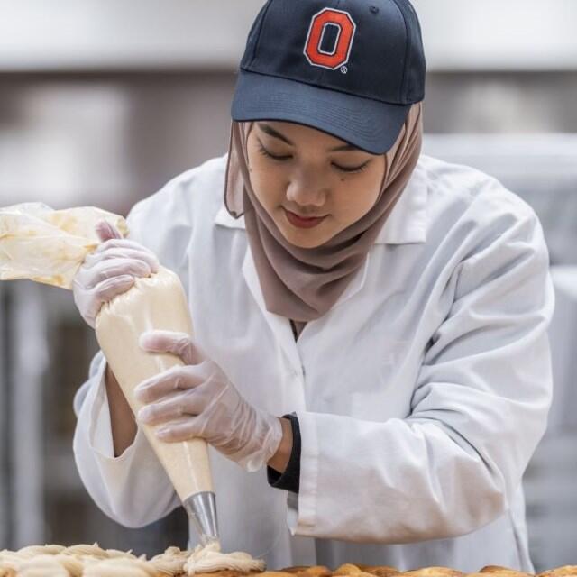 Student Icing Cookies